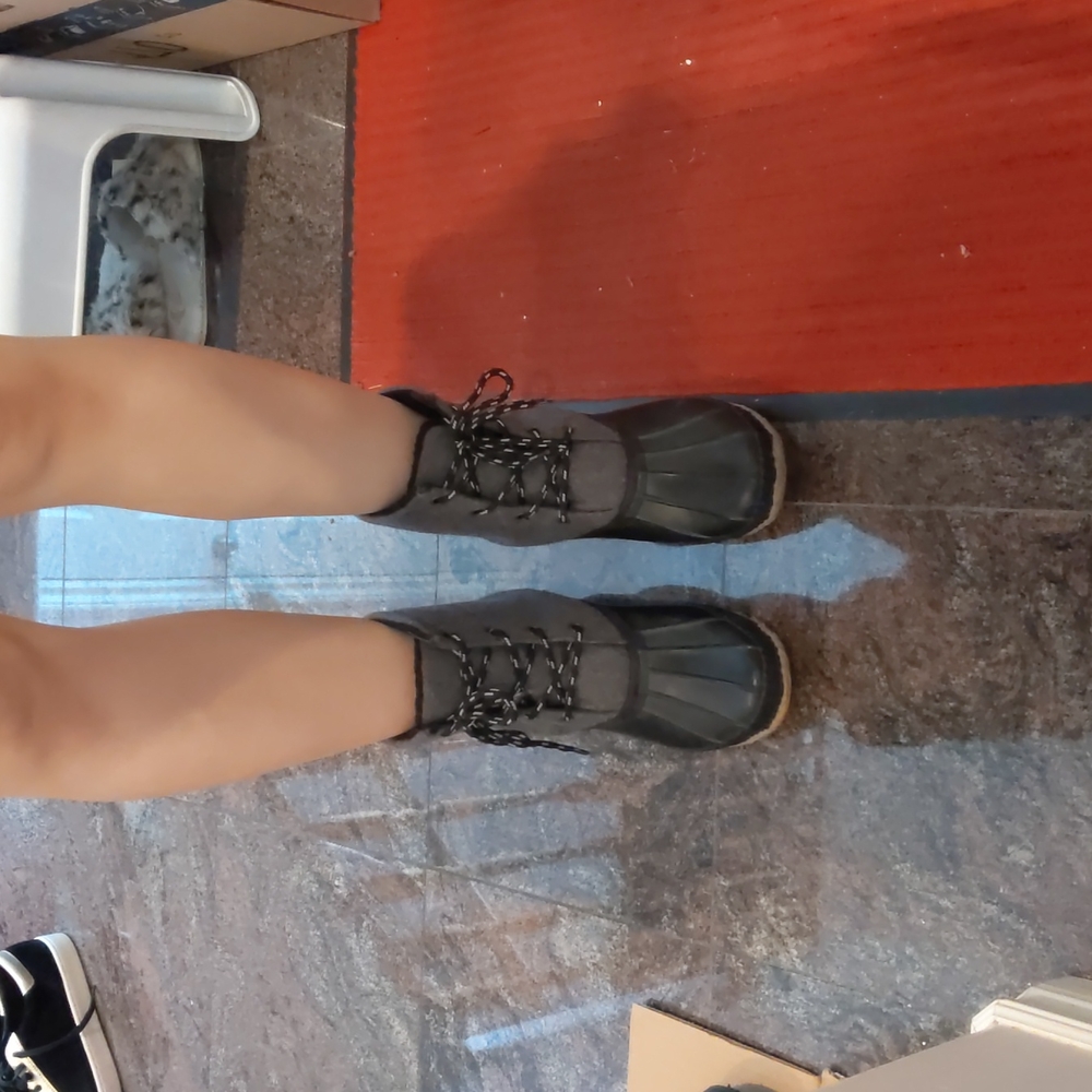 Black and grey rubber laced rainboots